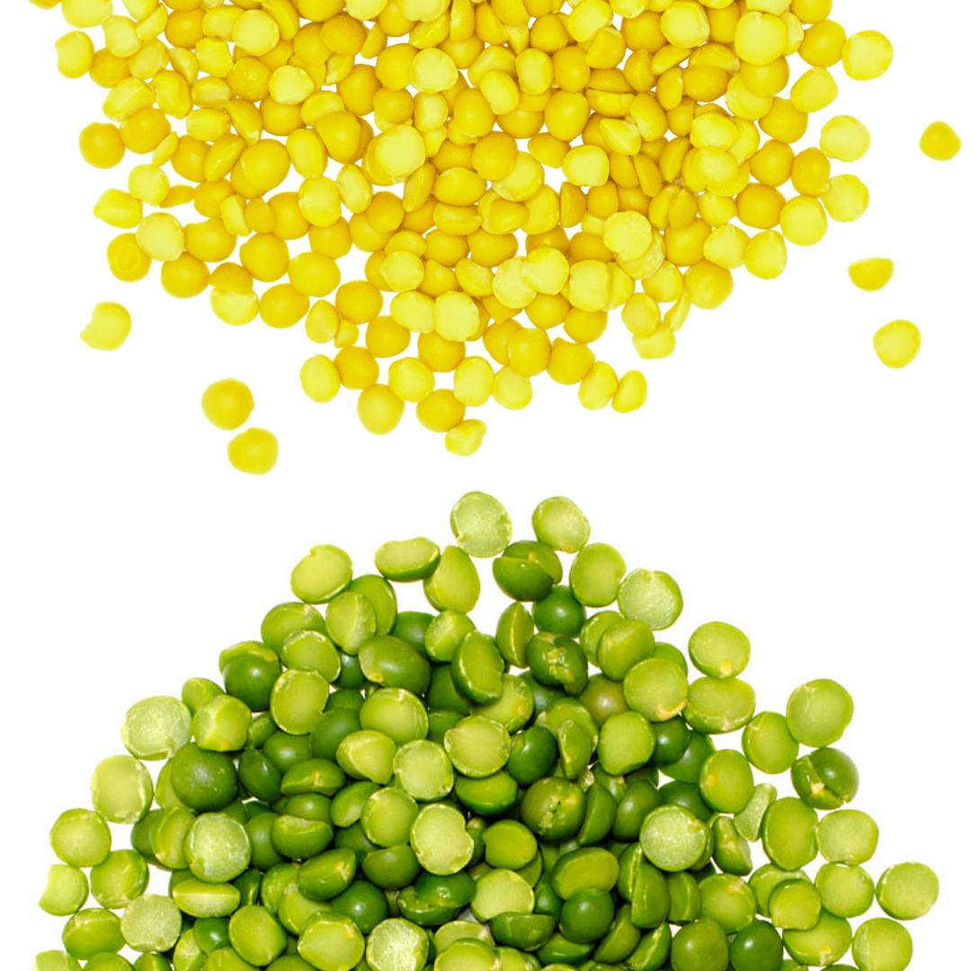 Two separate piles of dried yellow split peas and dried green split peas.