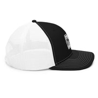a black and white hat on a white background