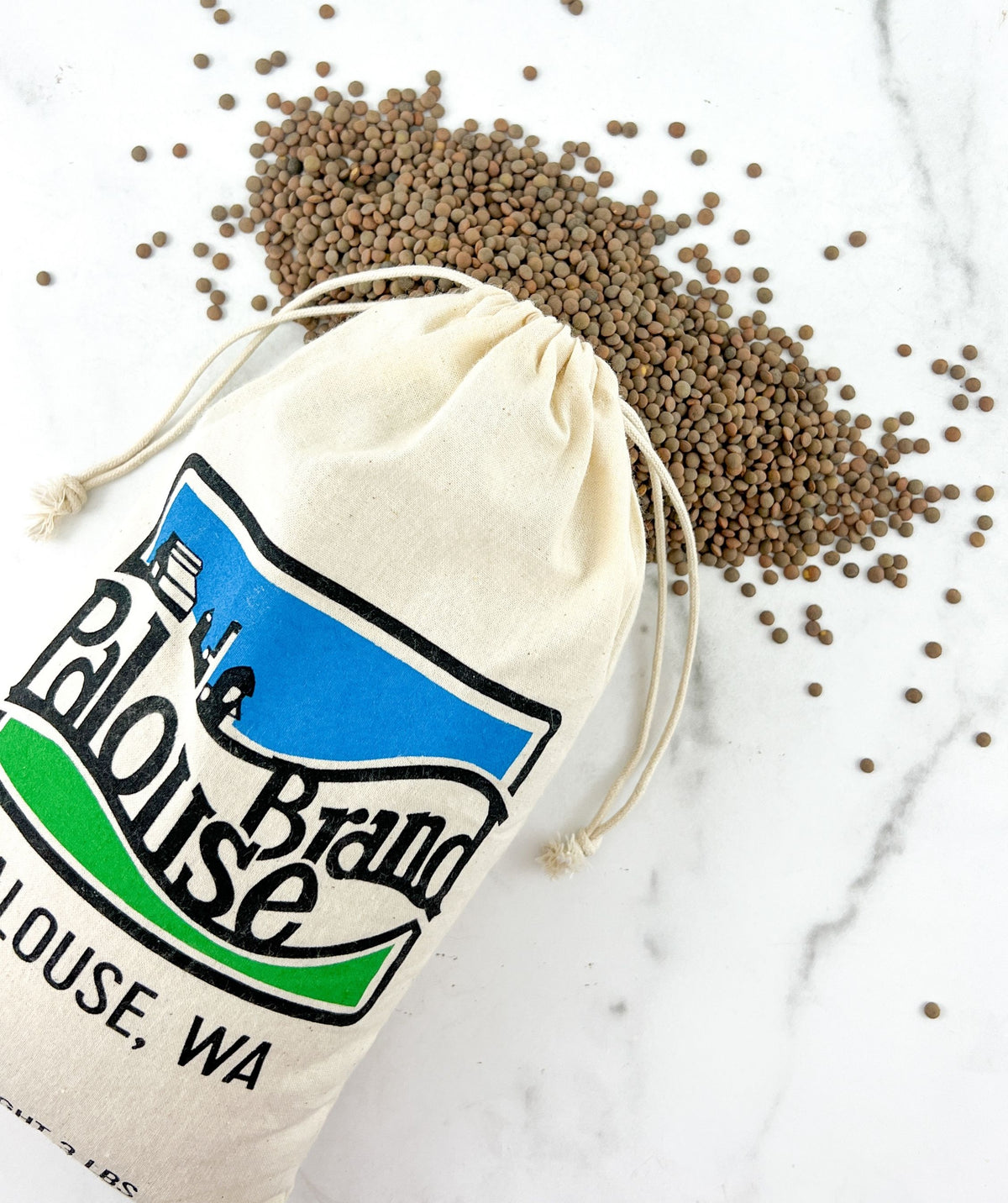 brown lentils spilling out of palouse brand bag