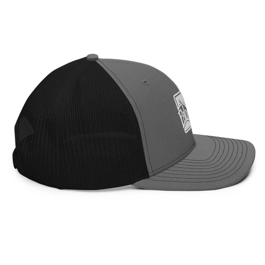 a black and grey hat with a white patch on the front