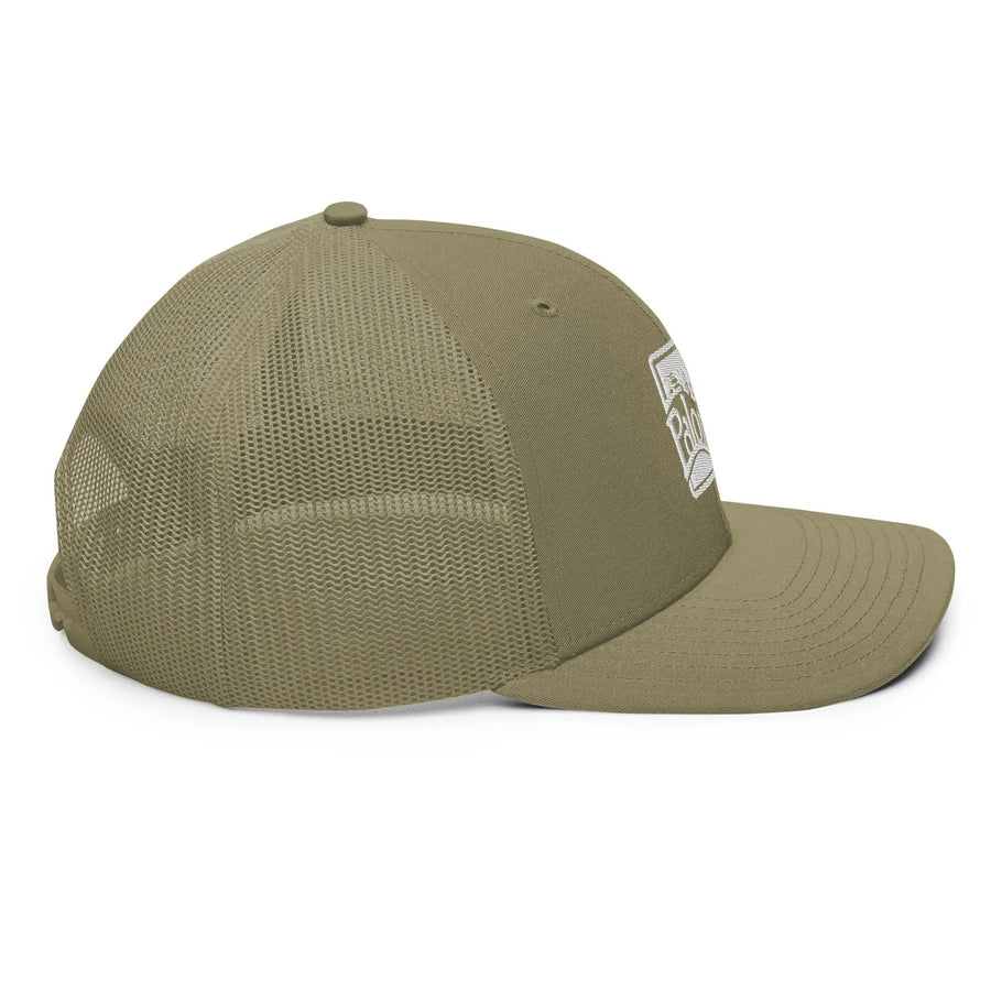 a khaki green hat with a white patch on the front